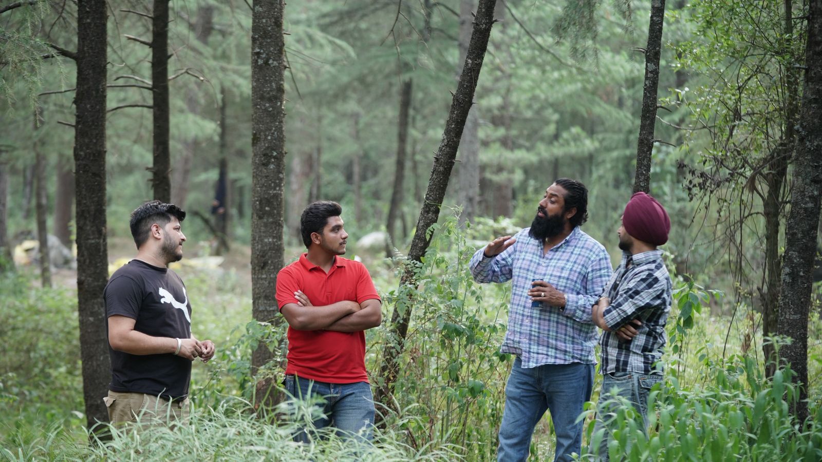 Asla Music production team collaborating on location during an artist project